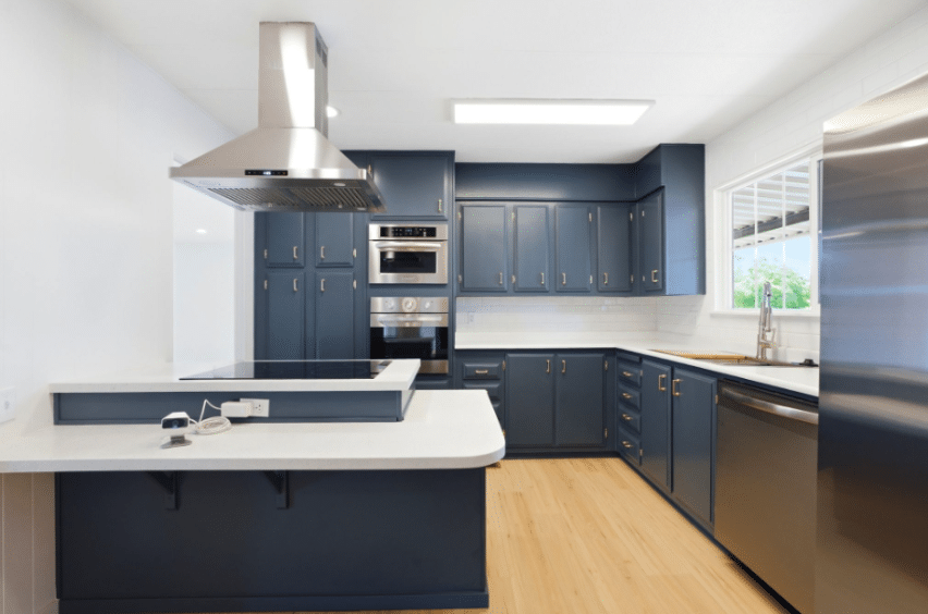 New flooring and can lighting in a renovated manufactured home