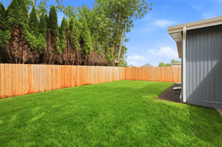 New fence and landscaping outside a renovated mobile home in Salem Oregon